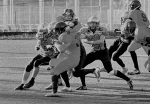 Tackling Football Players