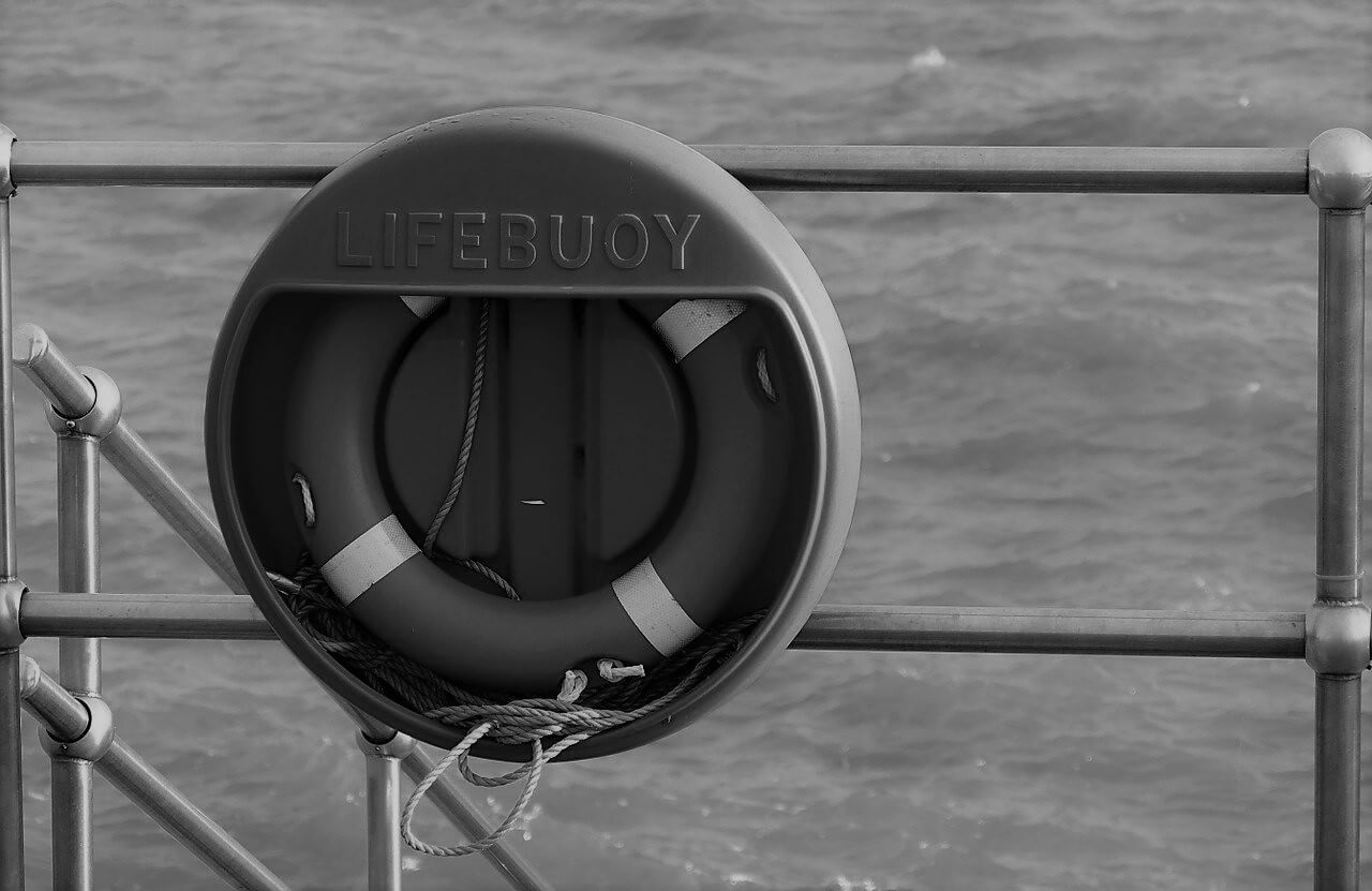 Black and white lifebuoy with Goldman Sachs logo