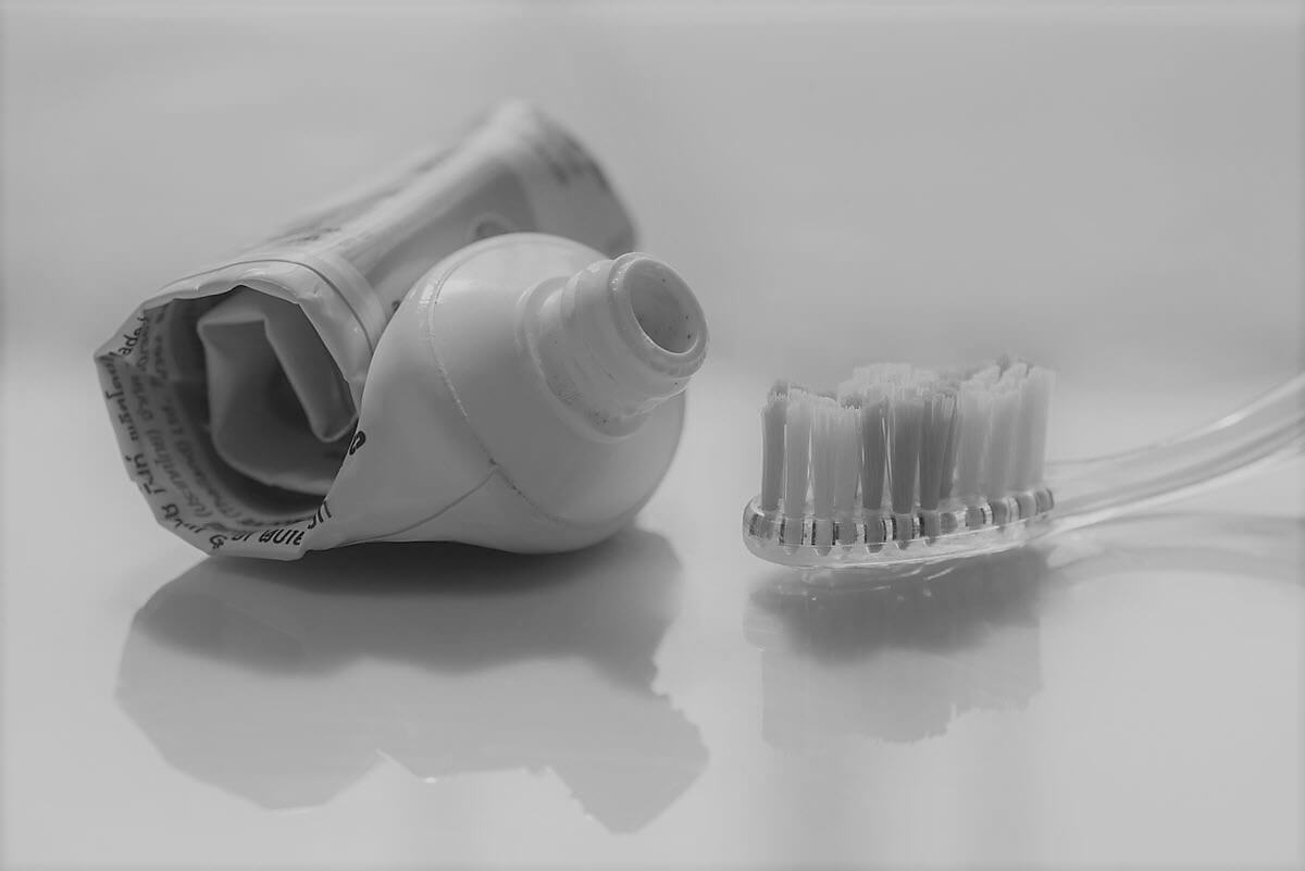 Empty toothpaste and brush, holding foreign companies accountable act