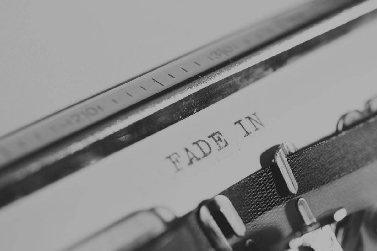 Typewriter typing "fade in" lawsuit