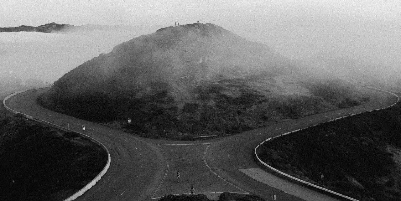 A Fork on the Road around a hill