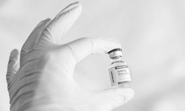 Biontech's Covid 19 Vaccine in a small white bottle