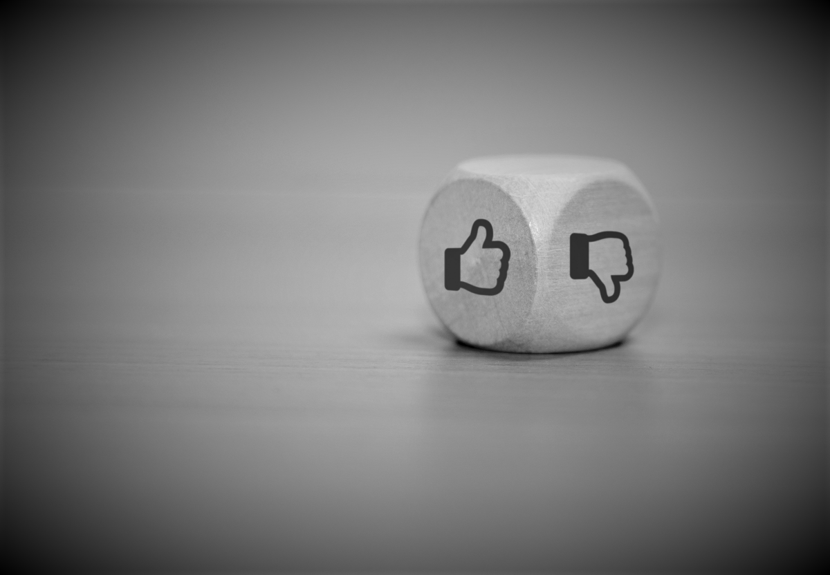 Dice with "like" and "dislike" sides