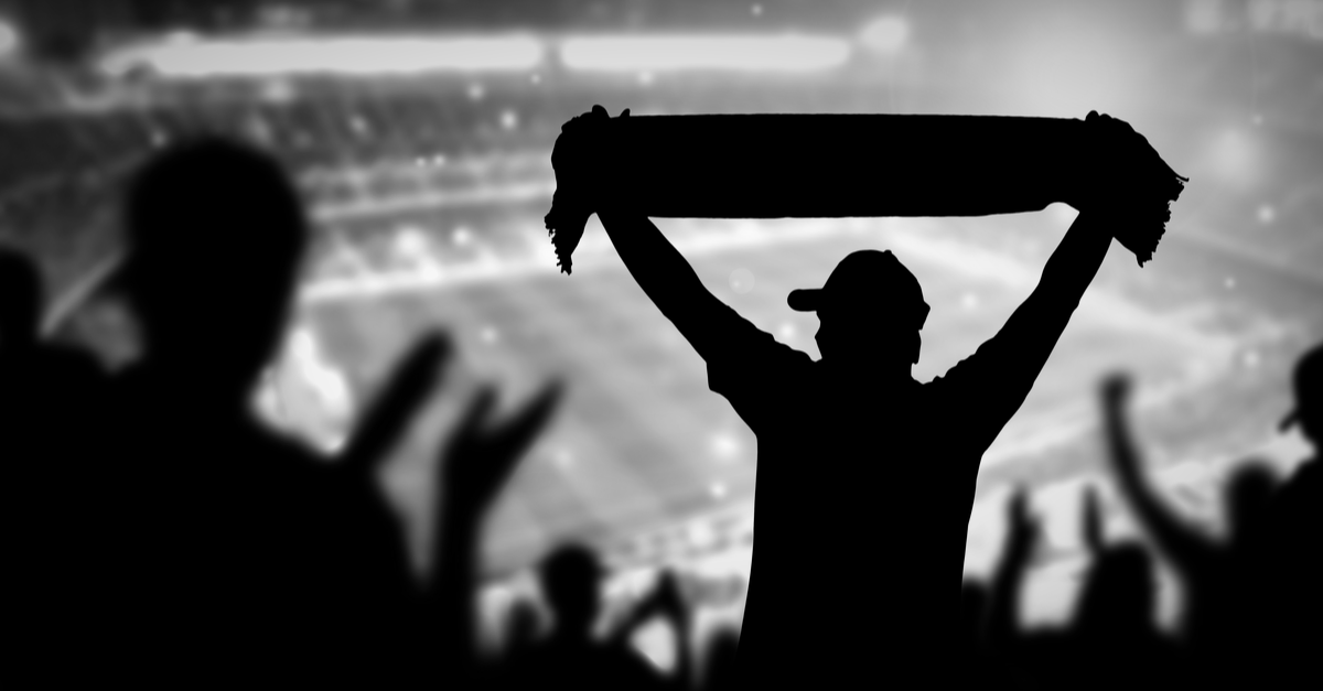 People Cheering on the Game, Holding up Banner Silhouette