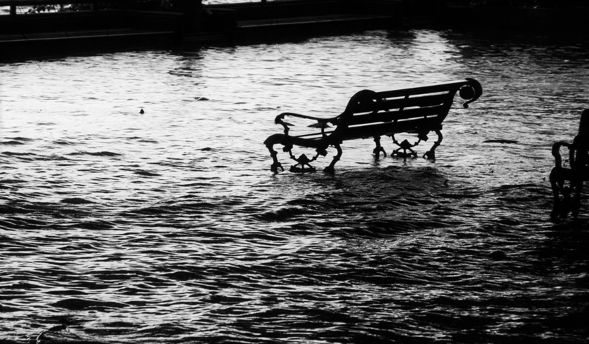 Street bench in flood water