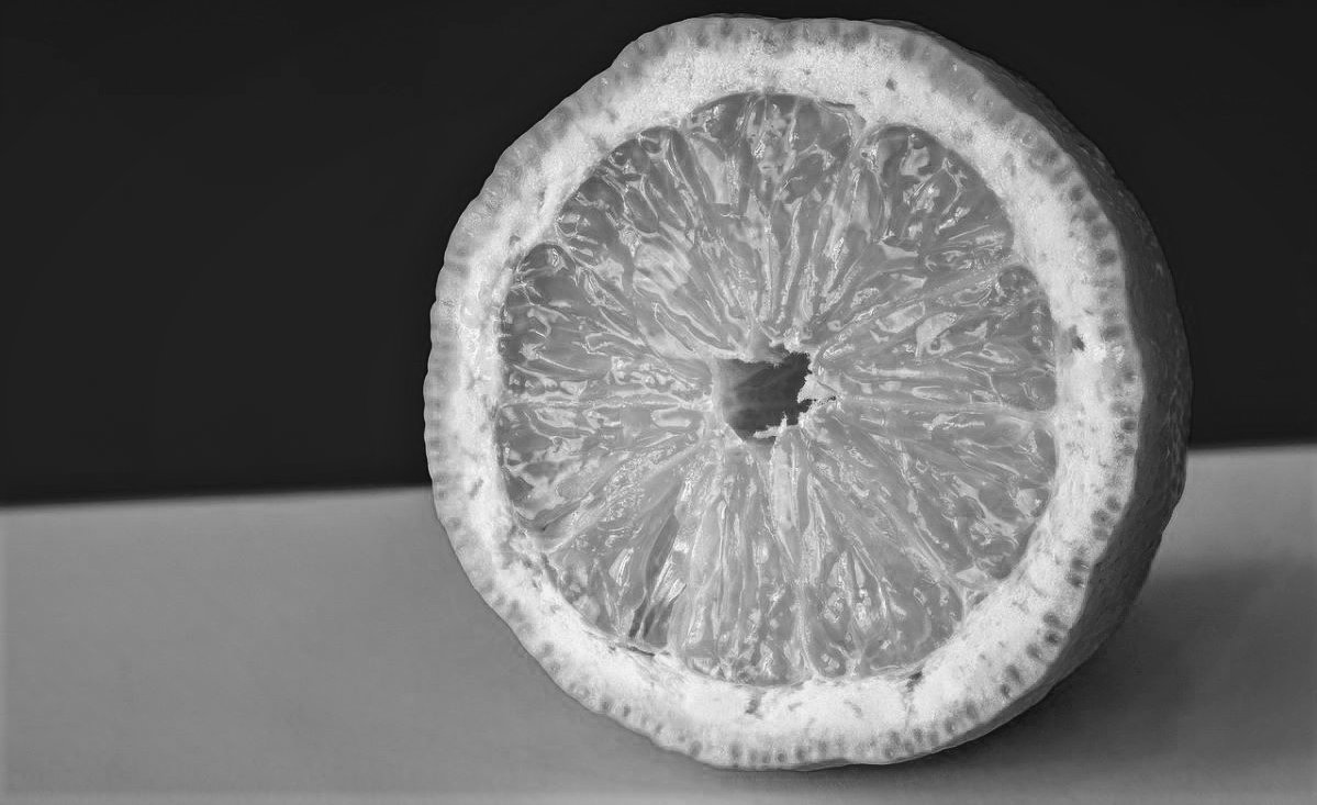 Monochrome image of half a lemon: When the Economy gives you lemons