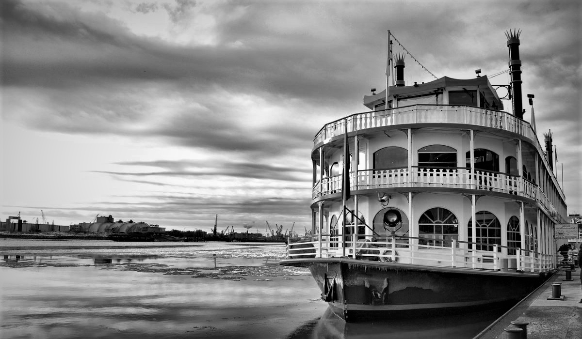 Lawyers on a classic Riverboat with heavy clouds in background