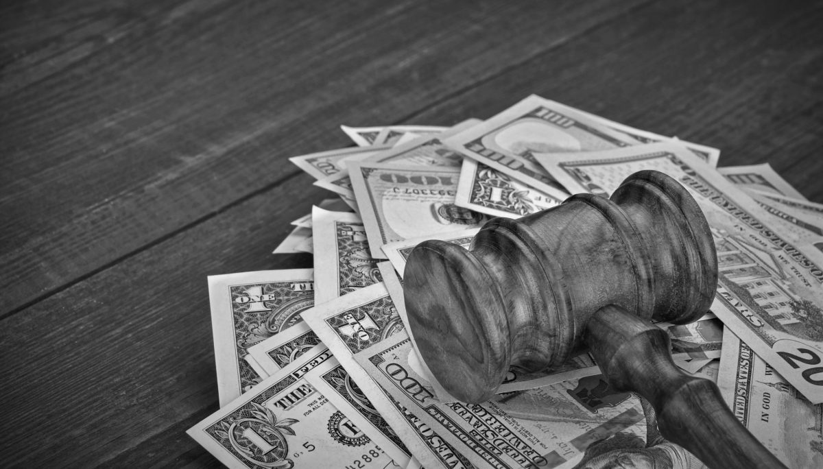 Judge's Gavel Sitting on American Dollar Bills: SEC using fines as deterrence