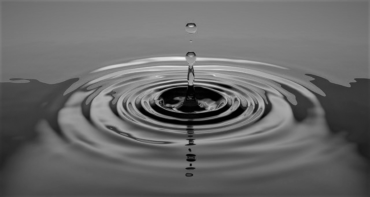 Circular ripples from a drop of water in a pool