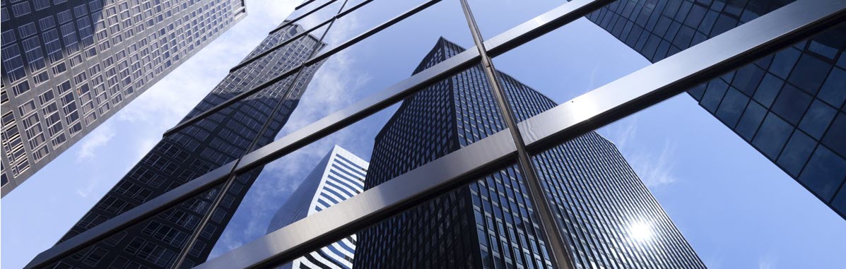 Photograph of skyscrapers with mirrored windows