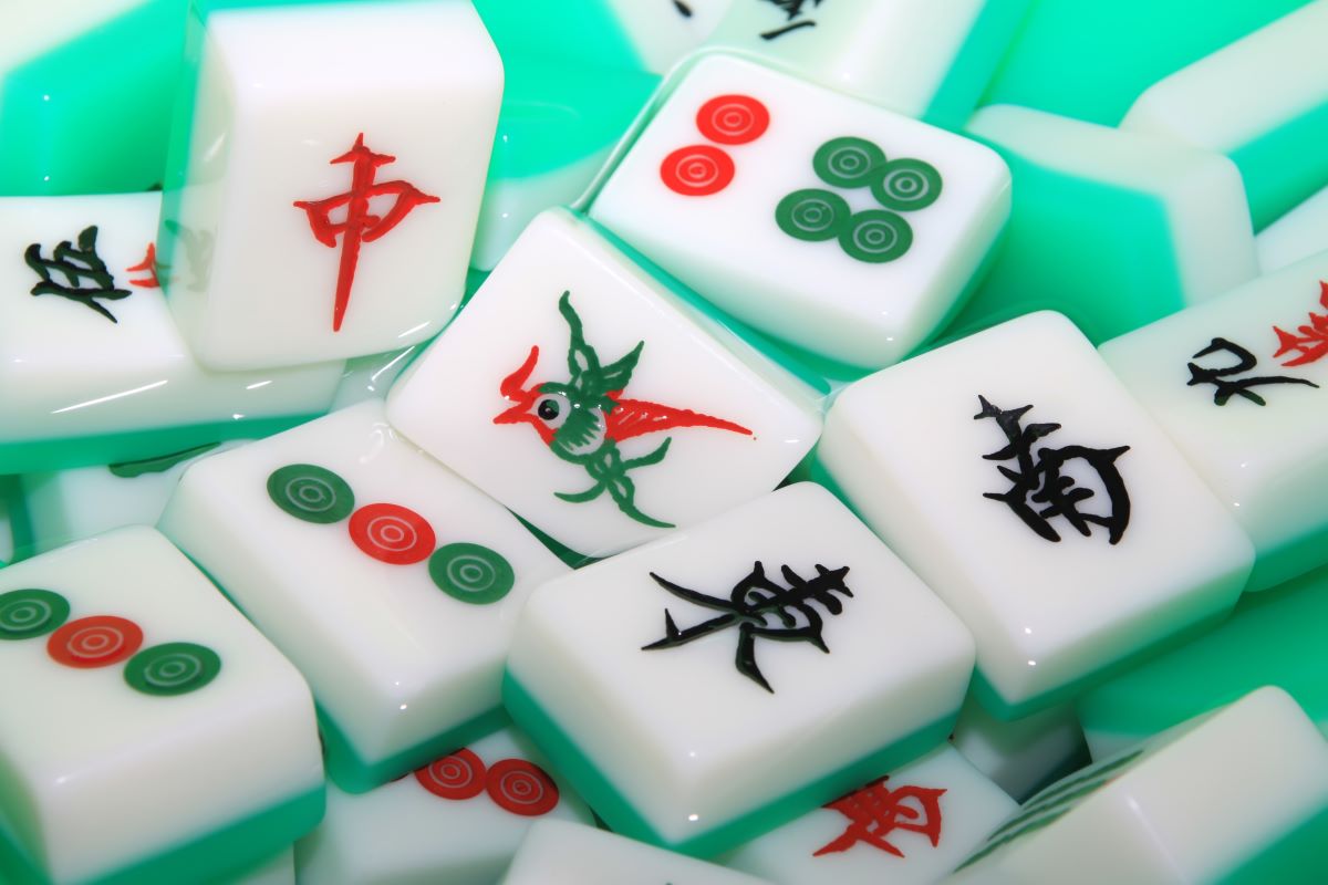 Mahjong tiles in pool of rising water