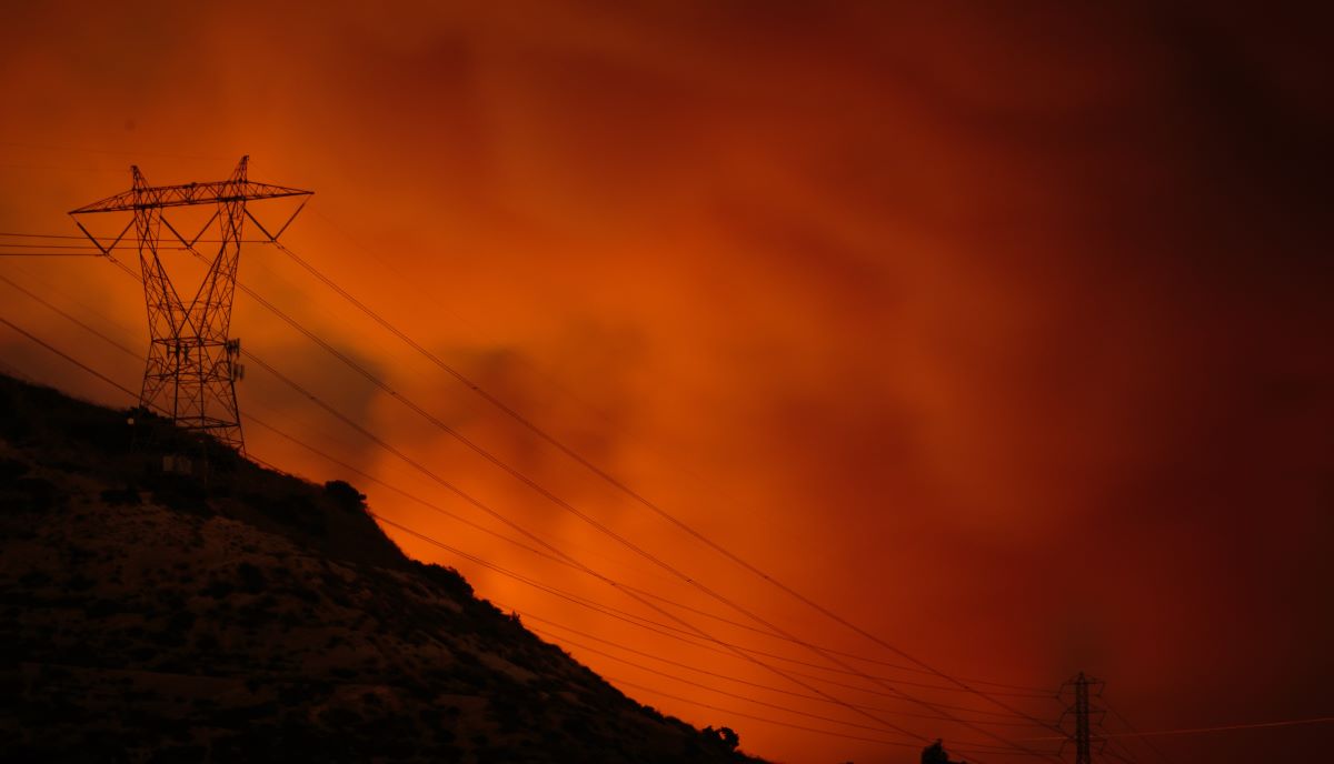 Ominous reddish-orange sky from wildfires in the California hills