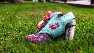 Opulent rococo-style shoe on a well groomed lawn