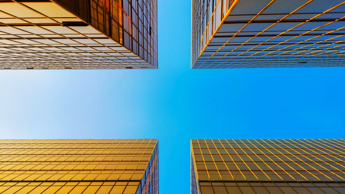 View of space between buildings looking up from below