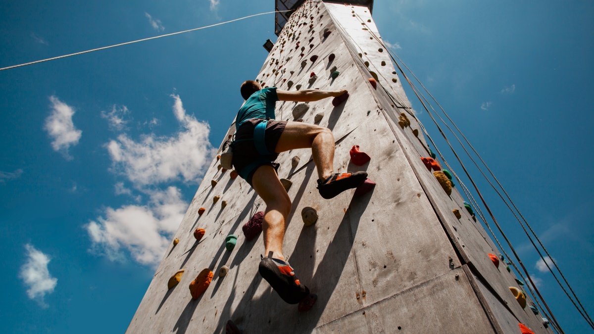 Man on climbing wall