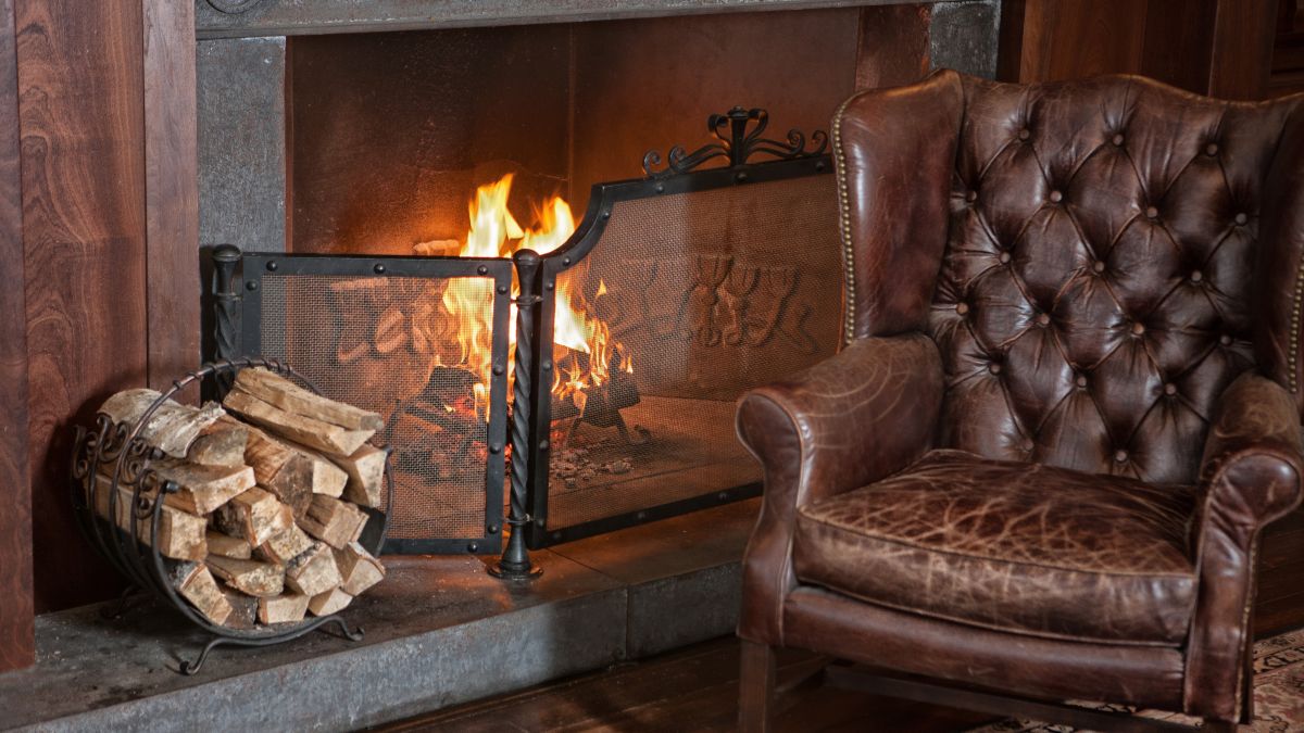 armchair next to fireplace