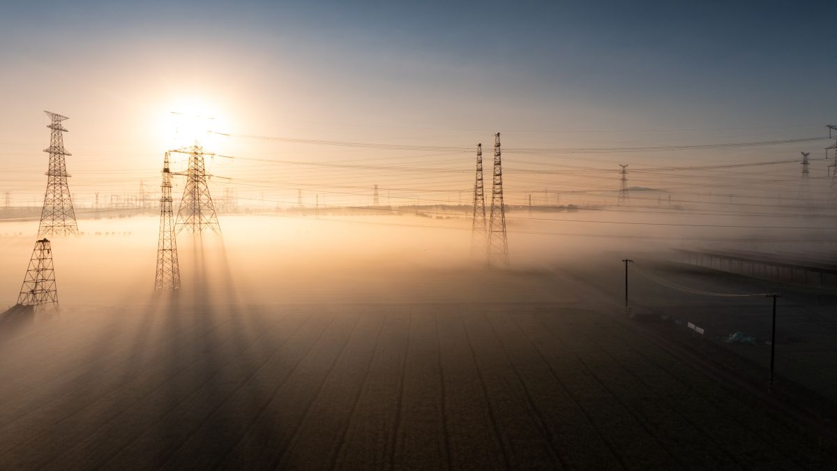 power transmission towers in fog
